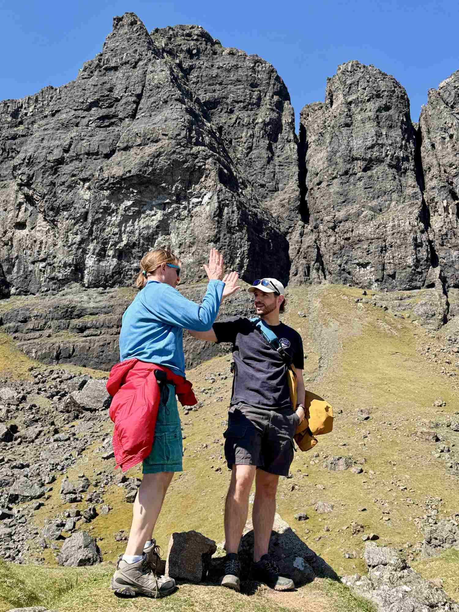 couple finishing old man of storr hike Skye
